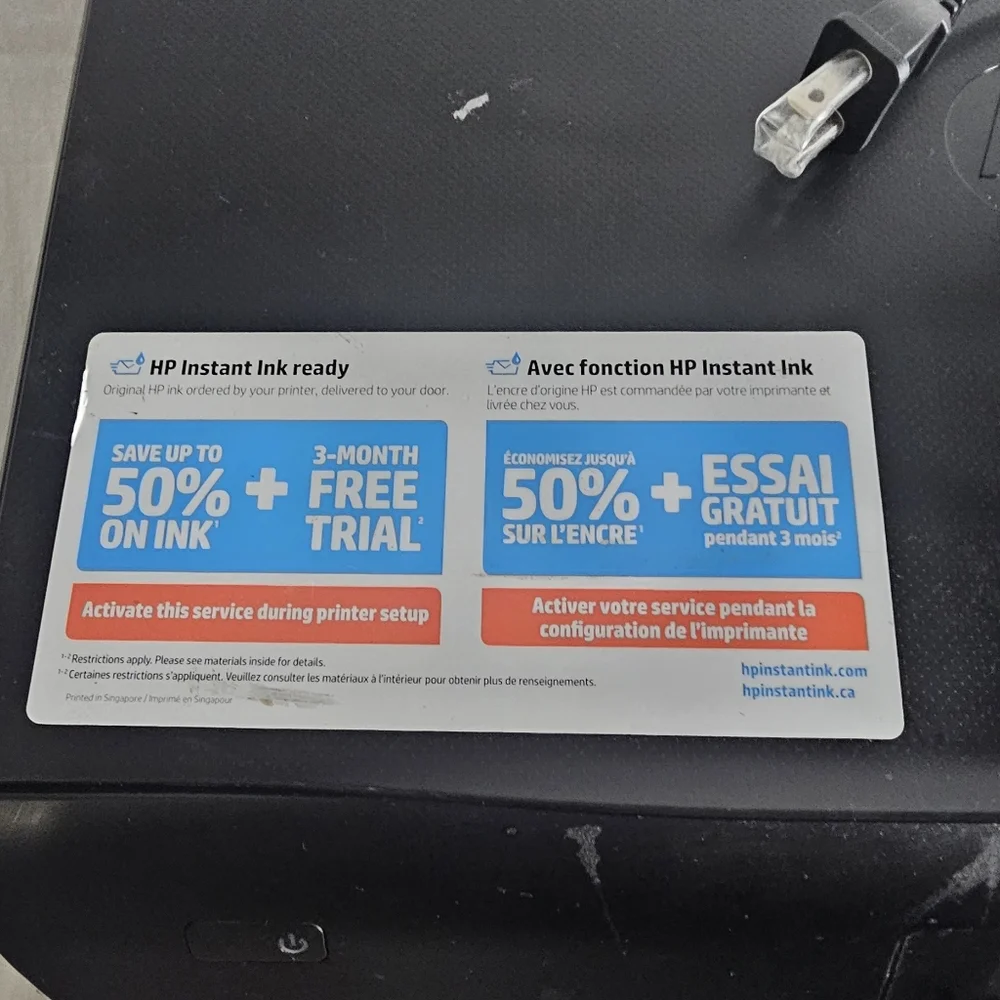 HP Black All-in-One Printer with Blue and White Instant Ink Sticker